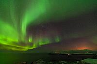 Northern Lights (Aurora borealis) over the Norwegian Sea, S$00F6r$00F6ya, Finnmark, Norway, December 2018 [IBR124563543]