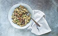Fusilli pasta, in creamy mushroom sauce, pasta with mushrooms, homemade, no people [IBR124585374]