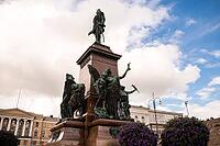 Helsinki, Finland - August 28, 2014 - Bronze alexander ii monument with ornate sculptures in helsinki's senate square [IBR124626854]