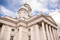 Helsinki, Finland - August 28, 2014 - Majestic exterior of helsinki cathedral against blue sky with clouds [IBR124626901]