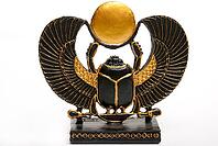 Egyptian scarab statue with outspread wings and a sun disk, detailed in gold and black [IBR124631248]