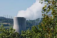 Nuclear power plant in Leibstadt with cooling tower and steam clouds, steam clouds over the nuclear power plant cooling turn, energy generation plant with nuclear power plant, nuclear power plant cooling tower between trees with steam clouds and power pol [IBR124636291]