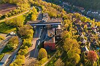 Aerial view of a building complex with roads and trees in an autumnal village environment, Calw District Office, Calw District, Germany [IBR124642837]