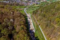 View of road works in rural, wooded area from above, construction of bicycle path, Aidlingen, Böblingen district, Germany [IBR124642858]
