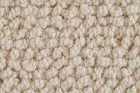 Closeup detail of beige carpet texture background [IBR124676052]