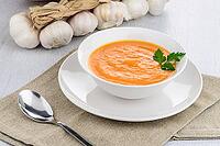 Pumpkin soup on white wood background [IBR124676076]