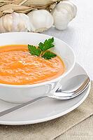 Pumpkin soup on white wood background [IBR124676077]
