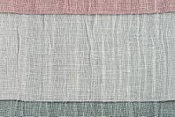Closeup detail of beige fabric texture background [IBR124676093]