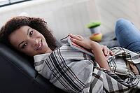 Lifestyle. Beautiful woman at home [IBR124724819]