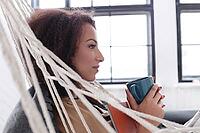 Lifestyle. Beautiful woman at home [IBR124724823]