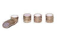 Heap of coins on a white background [IBR124724855]