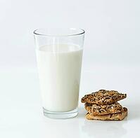 Glass of milk on the table [IBR124724857]