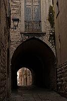 Narrow street in Trani, Puglia, Italy [IBR124748859]