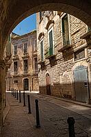 Narrow street in Trani, Puglia, Italy [IBR124748869]