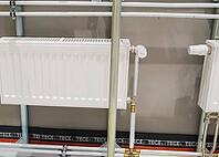 Heating radiators in a private house. installation of new radiators [IBR124748909]