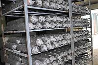 Briquettes for growing mushrooms, are stored for the germination of mycelium, waiting for the growth of mycelium [IBR124748913]
