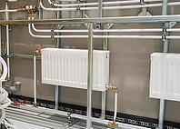 Heating radiators in a private house. installation of new radiators [IBR124748914]