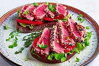 Sandwiches with fried tuna fillet in sesame seeds, breakfast, top view, homemade [IBR124748981]