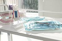Sterile medical instruments, lying on a tray in protective packaging, dentist's instruments, preparation for a medical procedure [IBR124748991]