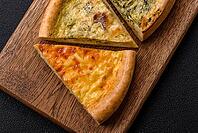 Food, Delicious quiche with broccoli, chicken or salmon and cheese with salt and spices on a dark concrete background [IBR124773758]