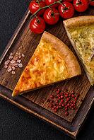 Food, Delicious quiche with broccoli, chicken or salmon and cheese with salt and spices on a dark concrete background [IBR124773762]