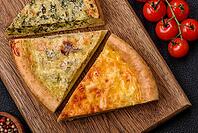 Food, Delicious quiche with broccoli, chicken or salmon and cheese with salt and spices on a dark concrete background [IBR124773770]