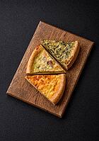 Food, Delicious quiche with broccoli, chicken or salmon and cheese with salt and spices on a dark concrete background [IBR124773771]