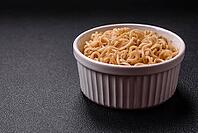 Food, Asian dish rice noodles with salt and spices on dark concrete background [IBR124773786]