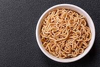 Food, Asian dish rice noodles with salt and spices on dark concrete background [IBR124773788]