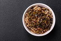 Food, Asian dish rice noodles with salt and spices on dark concrete background [IBR124773791]
