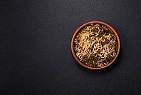 Food, Asian dish rice noodles with salt and spices on dark concrete background [IBR124773794]