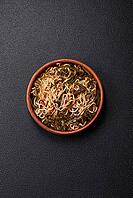 Food, Asian dish rice noodles with salt and spices on dark concrete background [IBR124773799]