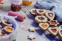 Homebaked Christmas Cookies With fruit Jam filling and Icing Sugar [IBR124817846]