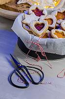 Homebaked Christmas Cookies With fruit Jam filling and Icing Sugar [IBR124817851]