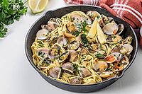 Traditional italian seafood pasta with clams Spaghetti alle Vongole [IBR124817882]