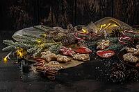 Baked Christmas cookies on rustic dark background [IBR124817909]