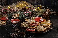 Baked Christmas cookies on rustic dark background [IBR124817922]