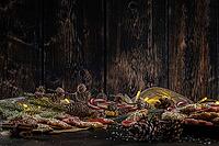 Baked Christmas cookies on rustic dark background [IBR124817925]