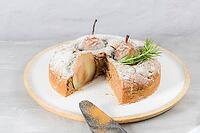 Delicious cake slice with pear, ginger and cinnamon on a plate in a dark kitchen counter [IBR124817927]