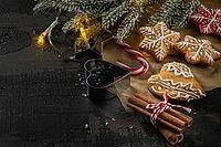 Baked Christmas cookies on rustic dark background [IBR124817929]