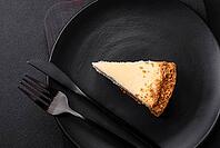 Food, Delicious sweet cheesecake cake on textured concrete background. Delicious breakfast dessert [IBR124842012]