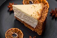 Food, Delicious sweet cheesecake cake on textured concrete background. Delicious breakfast dessert [IBR124842013]