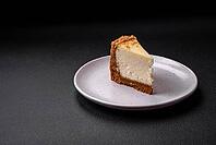 Food, Delicious sweet cheesecake cake on textured concrete background. Delicious breakfast dessert [IBR124842020]