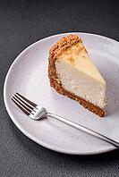 Food, Delicious sweet cheesecake cake on textured concrete background. Delicious breakfast dessert [IBR124842028]