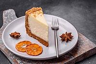 Food, Delicious sweet cheesecake cake on textured concrete background. Delicious breakfast dessert [IBR124842030]