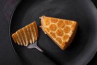 Food, Delicious fresh sweet honey cake layer cake with white cream on textured concrete background [IBR124842052]