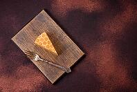 Food, Delicious fresh sweet honey cake layer cake with white cream on textured concrete background [IBR124842109]