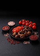 Grilled mushroom pieces, a vegetarian healthy meal with sauce. Barbecue mushroom halves as a food backdrop for your design [IBR124865233]