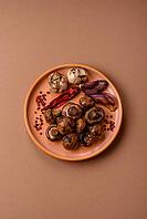 Grilled mushroom pieces, a vegetarian healthy meal with sauce. Barbecue mushroom halves as a food backdrop for your design [IBR124865234]
