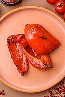 Grilled red bell peppers, vegetarian food. Red bell peppers as a food background for your design [IBR124865249]